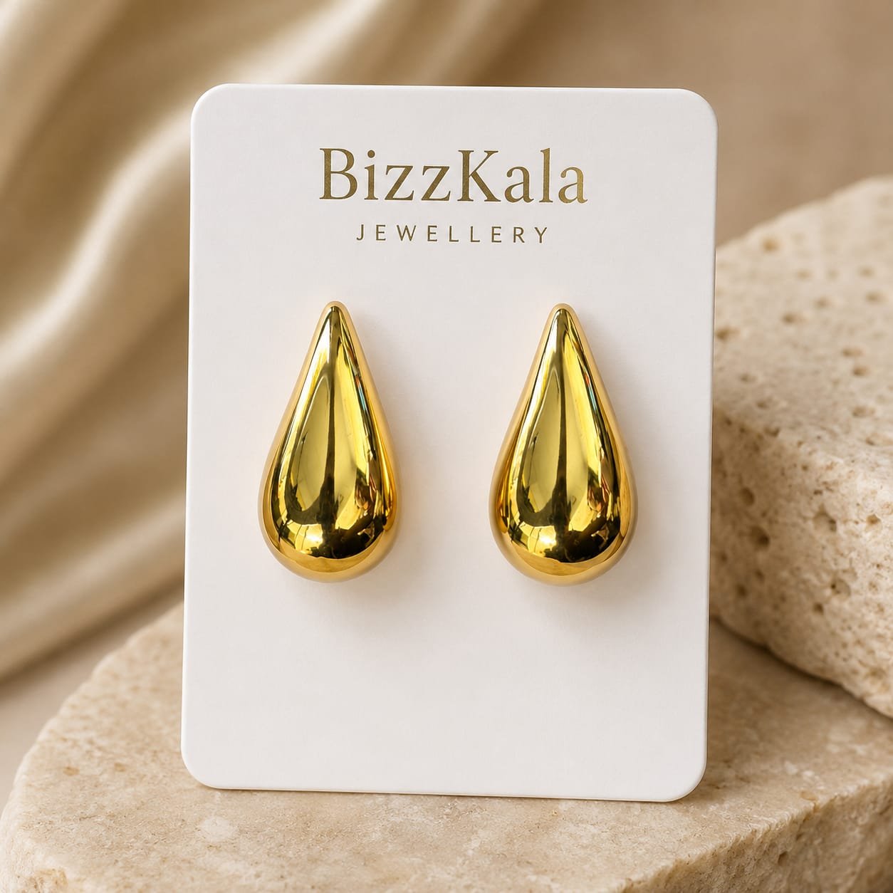 Gold Teardrop Stud Earrings for Women - Image 1