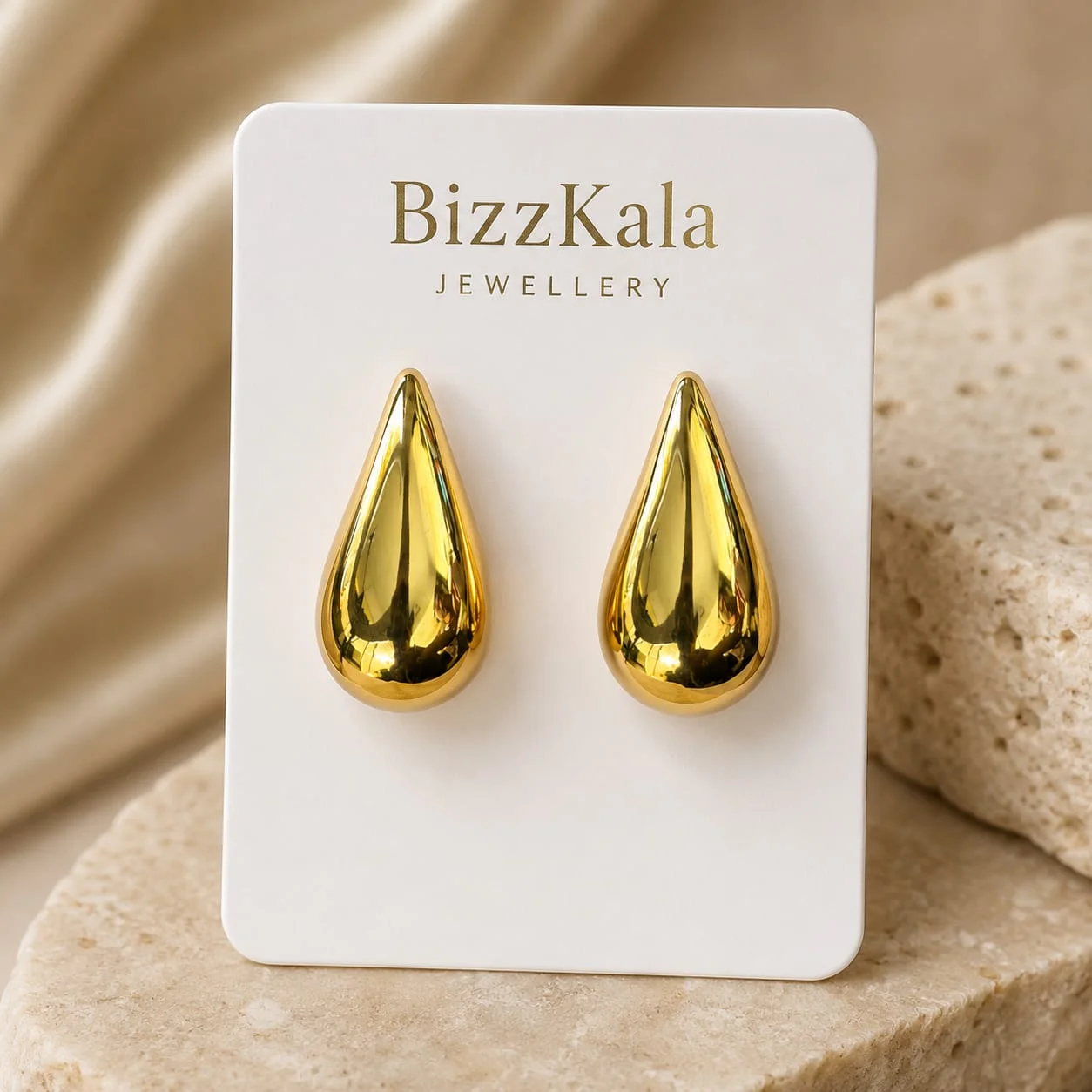 Gold Teardrop Stud Earrings for Women - Image 1