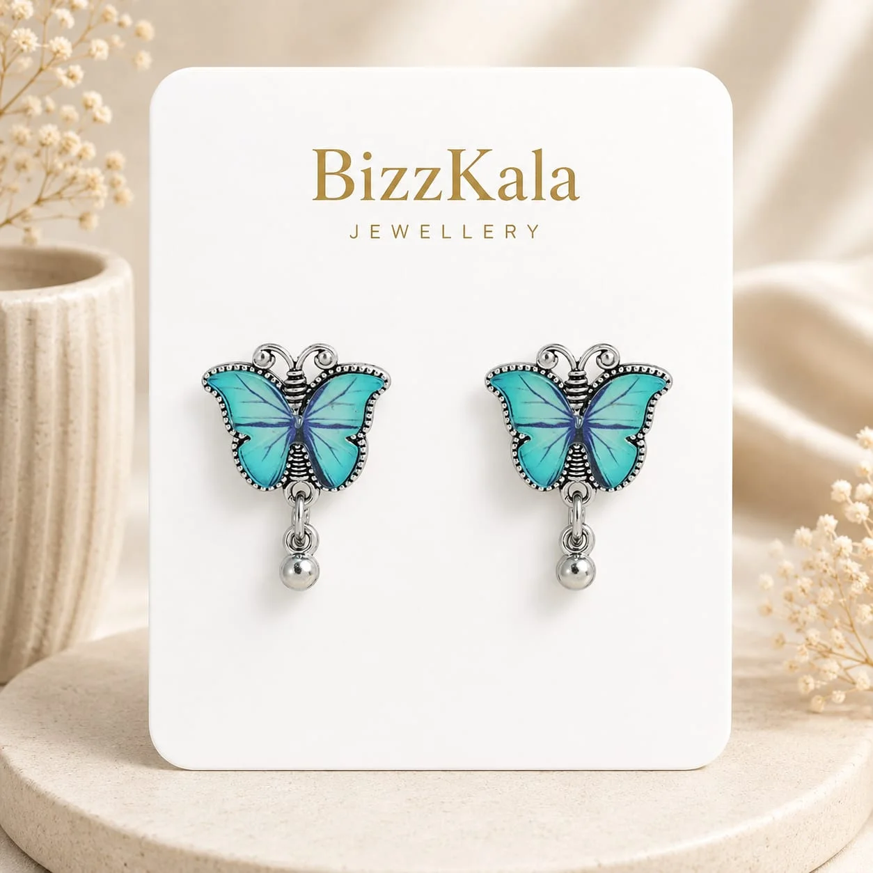 Sky Blue Butterfly Charm Jhumka for Women - Image 1