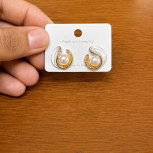 Pearl Swirl Stud Earrings in gold-tone style with curved swirl frames around pearl-like centres