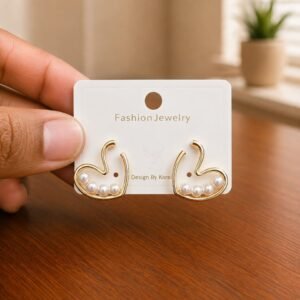 Swan Pearl Stud Earrings in gold-tone style with swan outlines with pearl-like body details