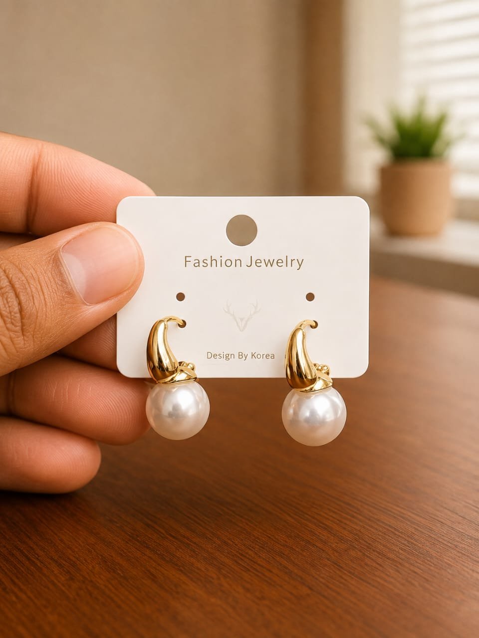 Pearl Hoop Drop Earrings in gold-tone style with small open hoops ending in pearl-like drops