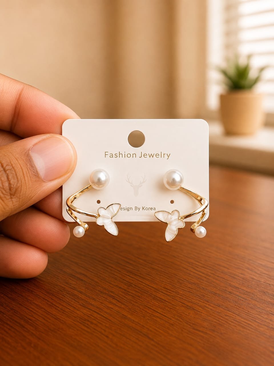 Curved Butterfly Pearl Ear Jacket Earrings in gold-tone style with pearl-like studs with curved butterfly ear jackets