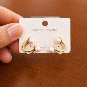 Pearl Double Hoop Stud Earrings in gold-tone style with pearl-like studs above two curved open hoops