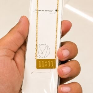 Gold-tone 11:11 necklace with a rectangular bar pendant