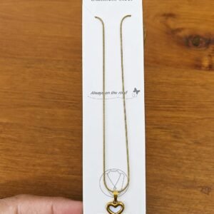 Gold-tone open heart pendant necklace with a pale blue center