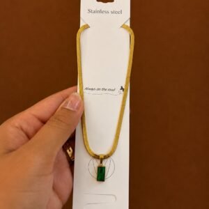 Gold-tone necklace with a rectangular green stone pendant