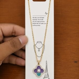 Gold-tone purple and turquoise flower necklace with a pearl-like center
