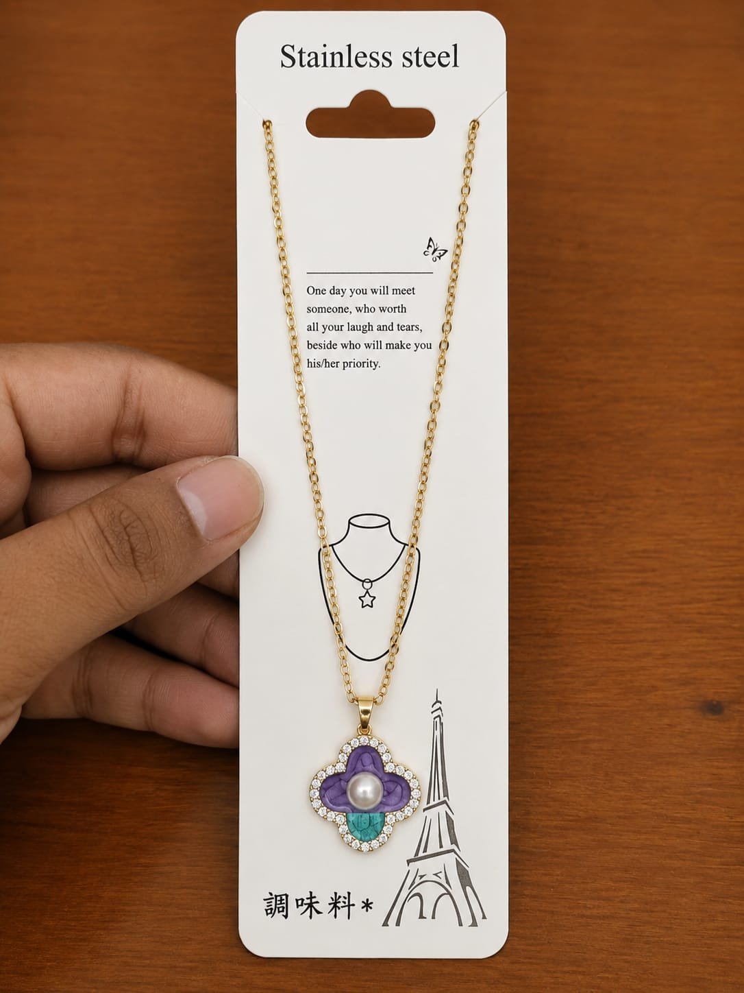Gold-tone purple and turquoise flower necklace with a pearl-like center