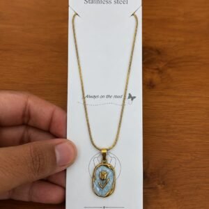Gold-tone tulip necklace with a blue oval medallion